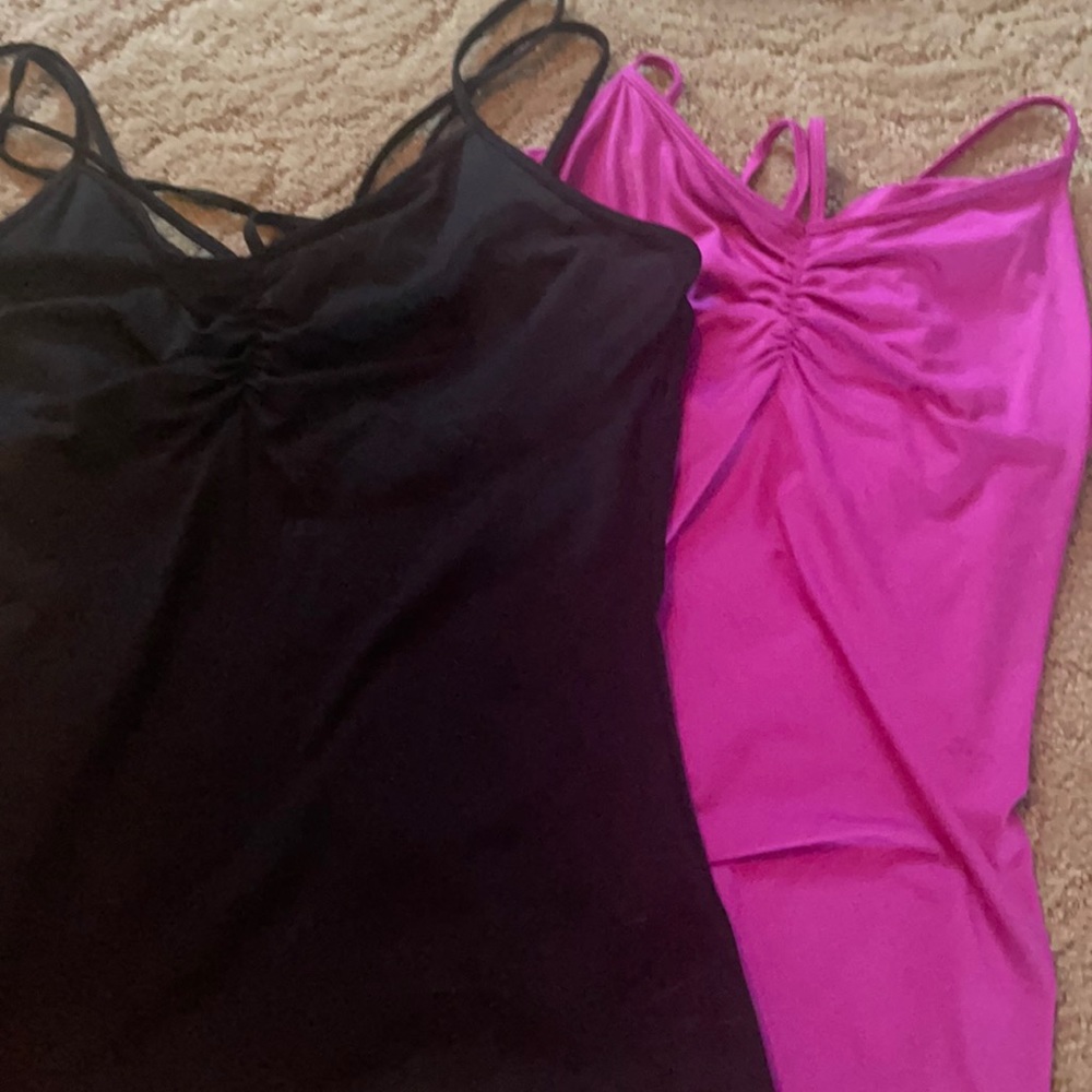 2 is better than 1. Like new tank top a with v straps.  Like new condition